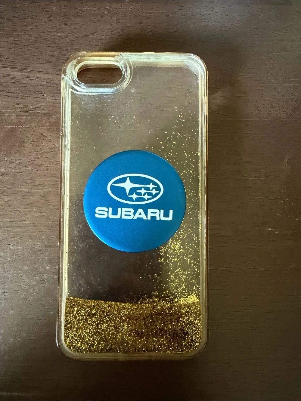 Blue PopSocket Phone Grip with Clear Gold Liquid Glitter Case